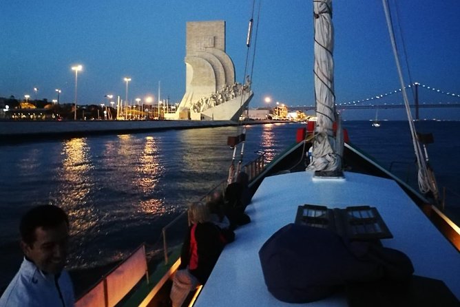 2-Hour Lisbon Traditional Boats Sunset Cruise with White Wine - Sunset, wine, and the boat’s social mood