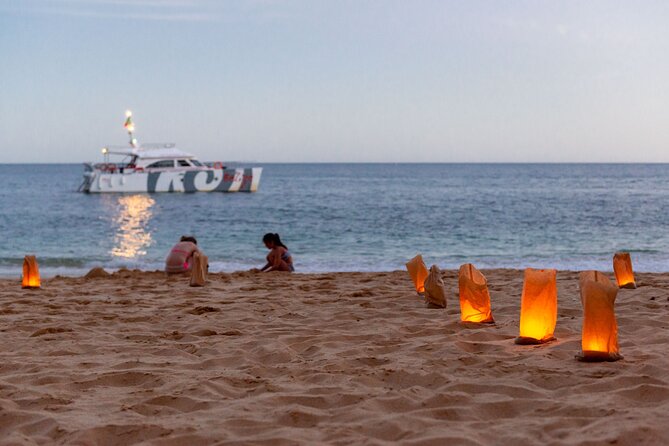 Albufeira: 6-Hour Sunset Dinner Catamaran Cruise with Open Bar - Music, fire dancing, and the return after sunset
