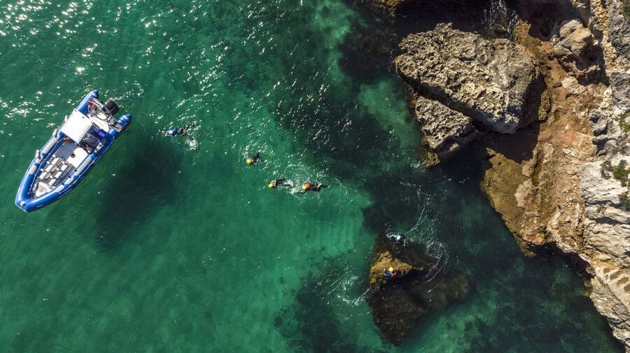 Arrábida: Setubal, Sesimbra Coasteering & Speedboat Tour - Caves, beaches, and the intertidal route