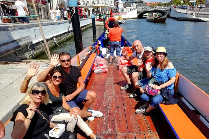 Aveiro and Costa Nova Half Day Tour from Porto with Boat Ride - Riding the traditional moliceiro for 45 minutes
