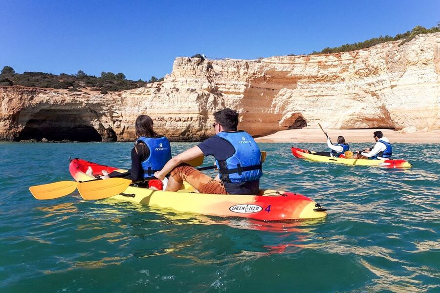 Benagil: Benagil Caves and Secret Spots Guided Kayaking Tour - The second hour: Praia da Marinha and a beach break
