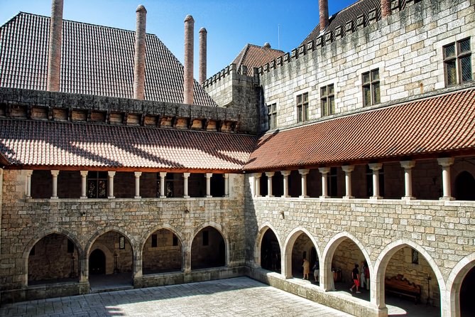 Braga & Guimarães Small Group Tour: Lunch & All Tickets Included - Walking through medieval Guimarães
