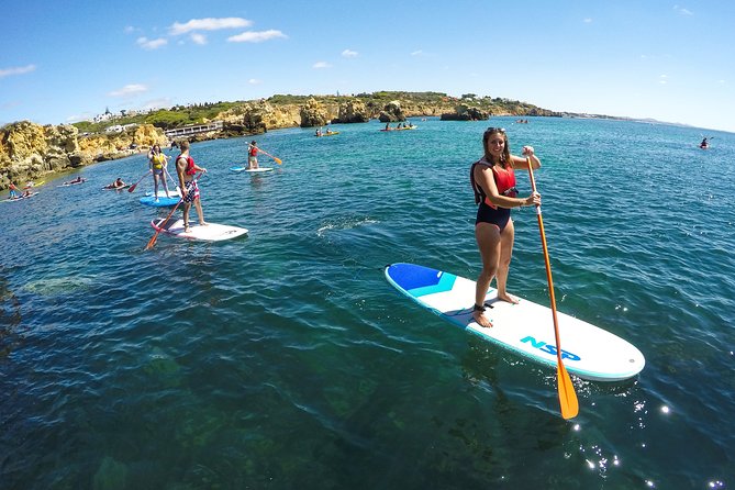Cliffs & Caves Stand Up Paddle Adventure - Entering the caves at water level