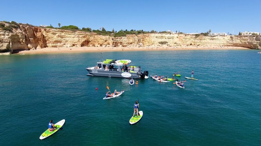 From Albufeira: Benagil Hidden Caves Tour by Kayak - The boat ride to Benagil