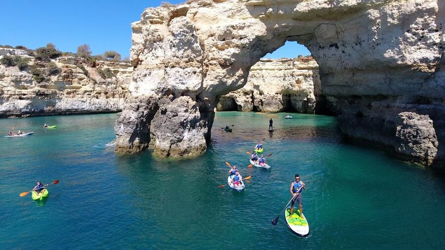 From Albufeira: Benagil Hidden Caves Tour by Kayak - Caves, arches, and small beaches by kayak
