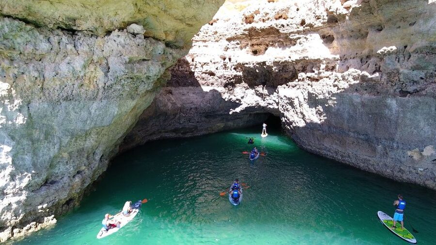 From Albufeira: Benagil Hidden Caves Tour by Kayak - The swim and return boat ride