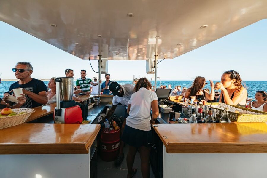From Albufeira: Sunset Cruise and Beach BBQ with Open Bar - Drinks, music, and the fire performance