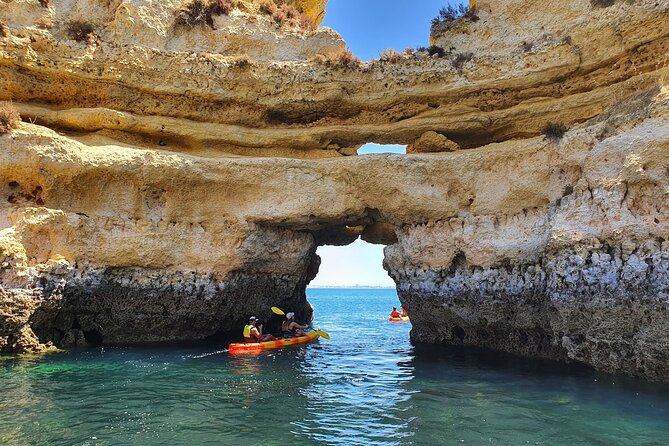 From Lagos: Kayak Tour of Ponta da Piedade Caves on Catamaran - Paddling through caves, arches, and coastal coves