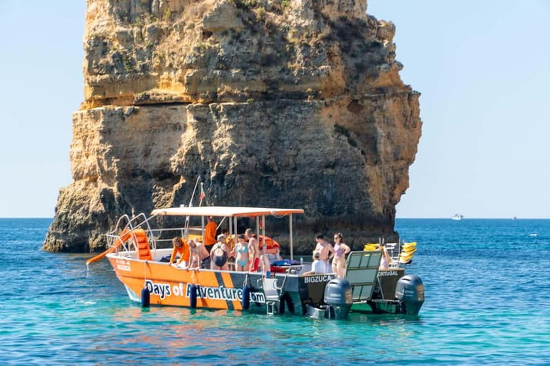 From Lagos: Ponta da Piedade Caves Kayak Tour from Catamaran - The short swim and the catamaran slide