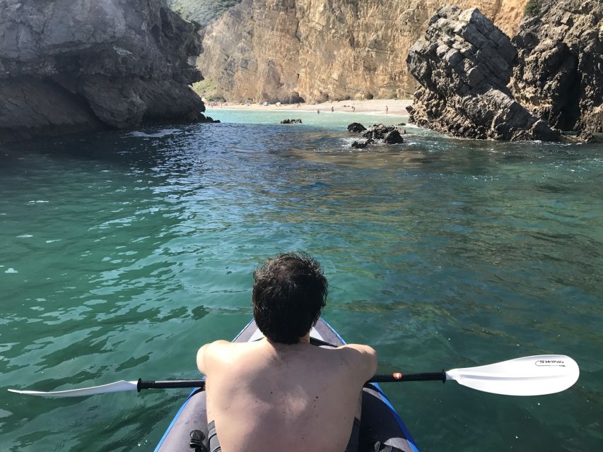 From Lisbon: Arrábida Natural Park Kayak Tour with Lunch - Preparing the kayaks at Praia do Creiro