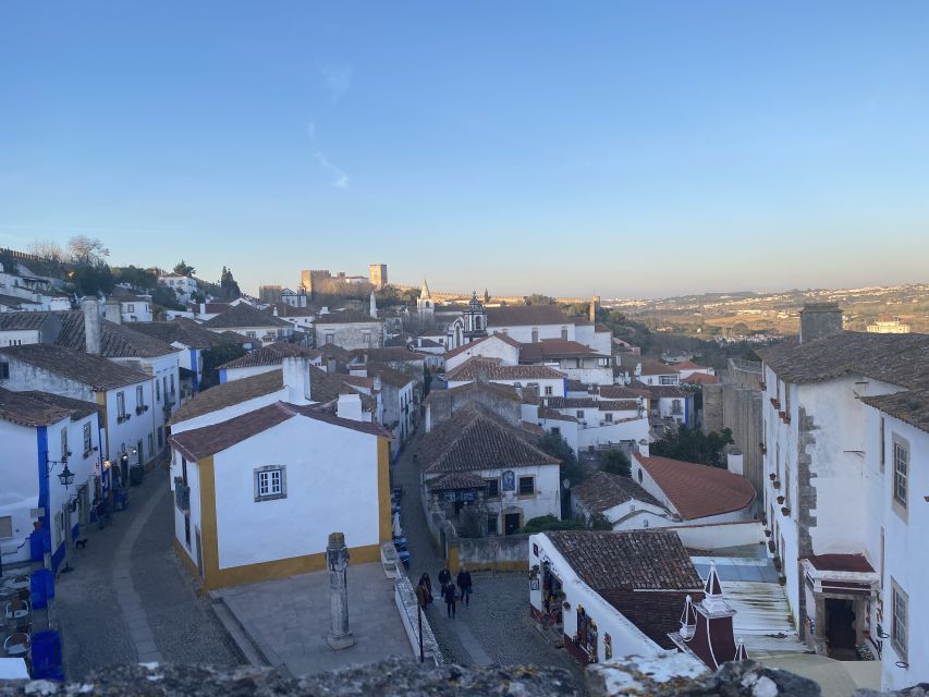 From Lisbon: Fátima, Batalha, Nazaré, and Obidos Tour by Van - Nazaré, salt air, and giant surf