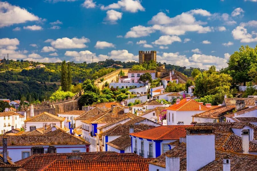 From Lisbon: Fatima, Batalha, Nazare, Obidos - Small Group - Leaving Lisbon in an air-conditioned van