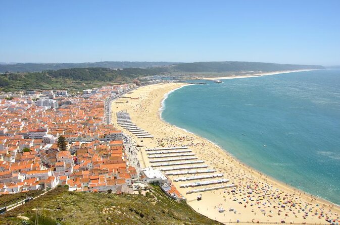 From Lisbon: Fátima, Nazaré, Batalha, and Óbidos Guided Tour - Four Portuguese highlights packed into one day