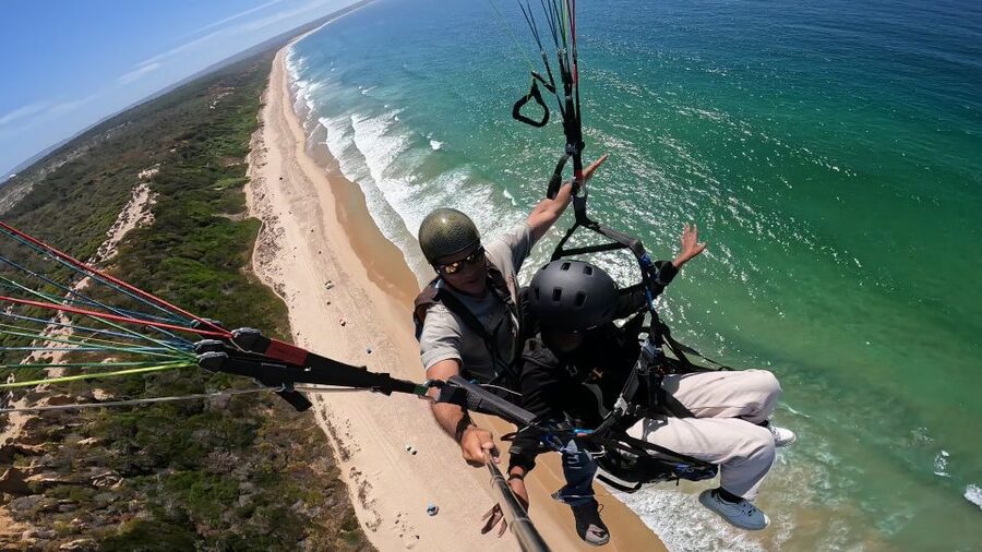 From Lisbon: Paragliding Tandem Flight - Preparing for takeoff on the coast