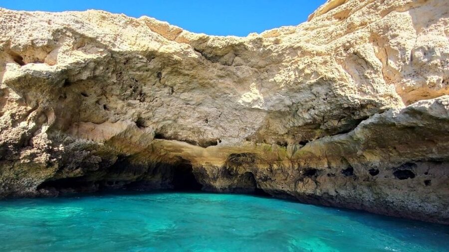 From Portimão: Algar de Benagil and Sea Caves Boat Tour - The optional swim stop