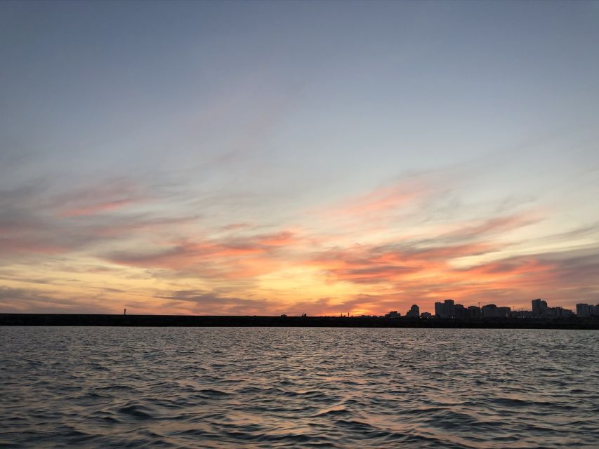 From Portimão: Sunset Boat Trip with Wine - Sailing Toward Alvor and João de Arens