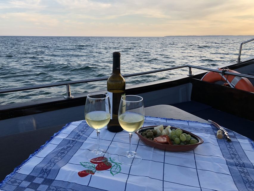 From Portimão: Sunset Boat Trip with Wine - The Guide and Language