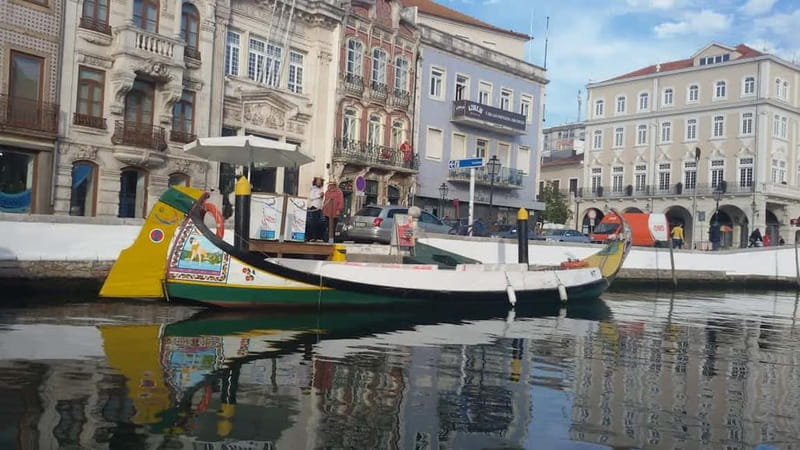 From Porto: Aveiro & Coimbra Tour with Moliceiro Boat Cruise - Aveiro’s canals, salt pans, and painted houses