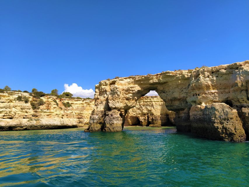 From Vilamoura: 2.5-Hour Benagil Cave and Dolphins Boat Tour - Approaching Benagil Cave and the coastal grottos