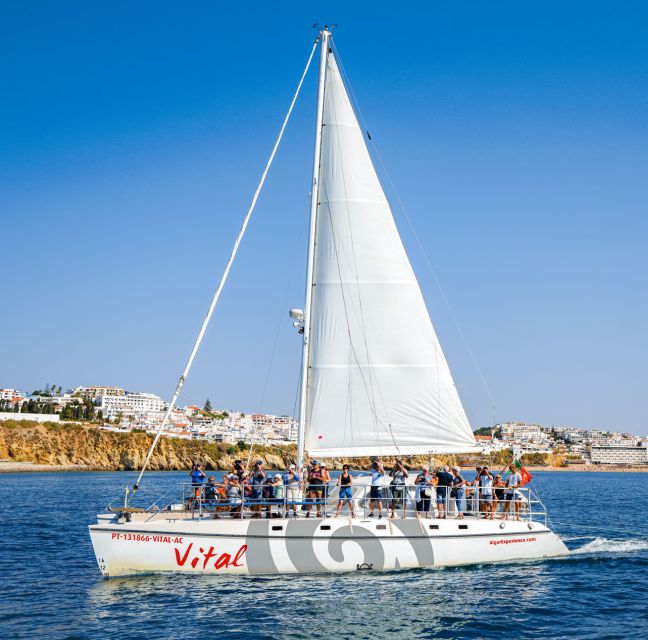 From Vilamoura: Sunset Catamaran Experience - The sunset return to Vilamoura