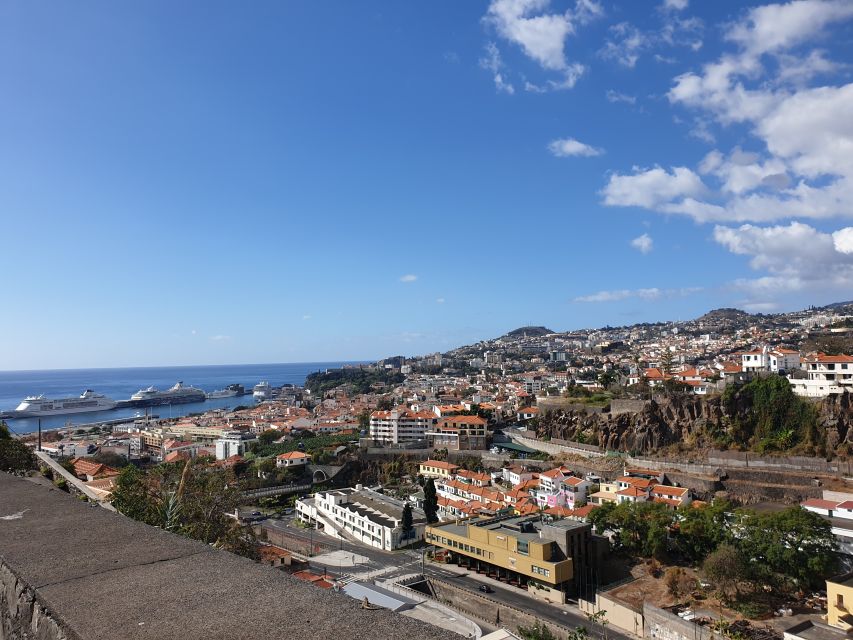 Funchal: Monte Toboggan and Old Town Tour by Tuk-Tuk - The old town, painted doors, and Farmers’ Market