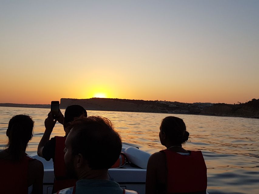 Lagos: Guided Ponta da Piedade Sunset Boat Tour - Ponta da Piedade lighthouse and the final sunset