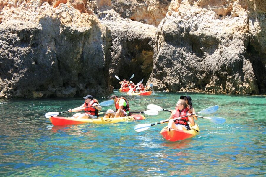 Lagos: Kayaking Tour - Returning to the catamaran for a swim