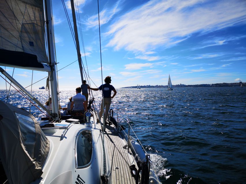 Lisbon: 2-Hour Sailing Yacht Cruise & Guided Tour w/2 drinks - Meeting near the Discoveries Monument in Belém