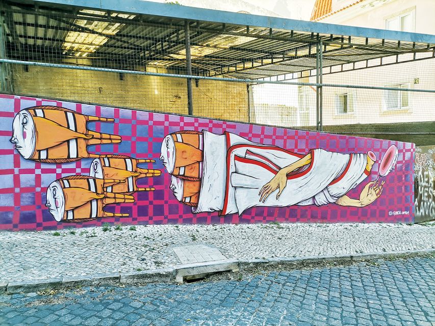 Lisbon: 2-Hour Street Art Photo Tour - The climb toward the castle hill