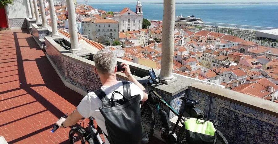 Lisbon: 7 Hills Panoramic Guided Tour by E-Bike - Senhora do Monte shows Lisbon from a higher perch