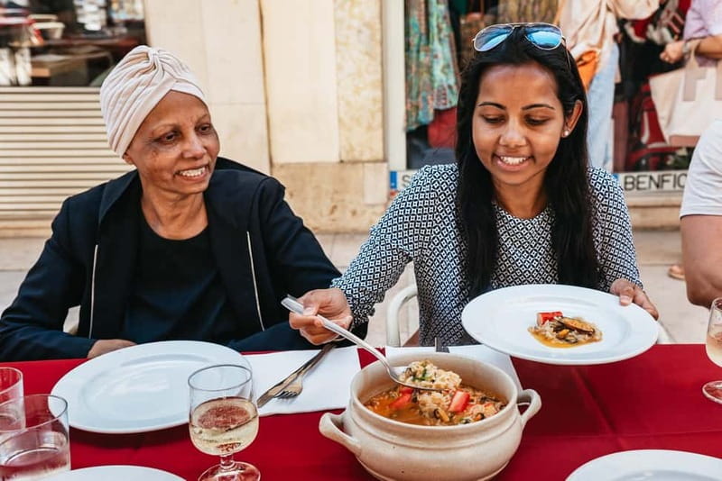 Lisbon: Baixa District Food Tour with Dinner and Drinks - Four drinks, from vinho verde to ginjinha
