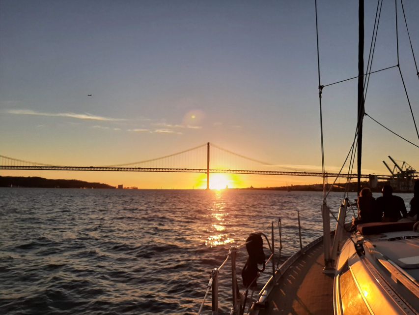 Lisbon: City Skyline Sailboat Cruise with Drink and Snacks - Praça do Comércio and Lisbon’s old center from the water