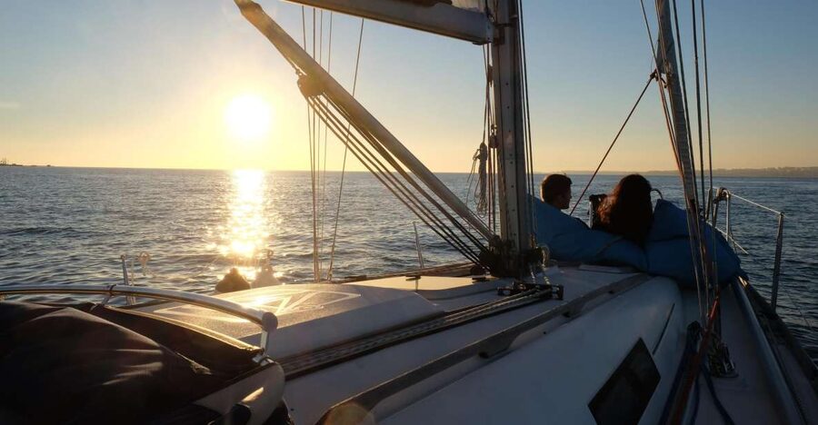 Lisbon: City Skyline Sailboat Cruise with Drink and Snacks - Crossing to Cacilhas for the classic Lisbon view