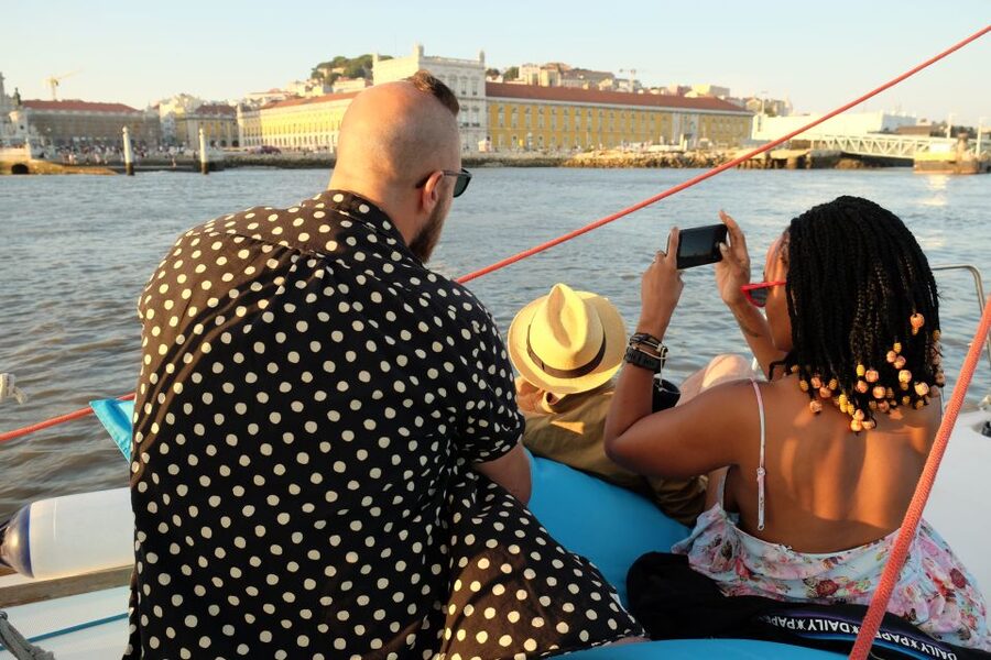 Lisbon: City Skyline Sailboat Cruise with Drink and Snacks - Sunset departures and changing weather