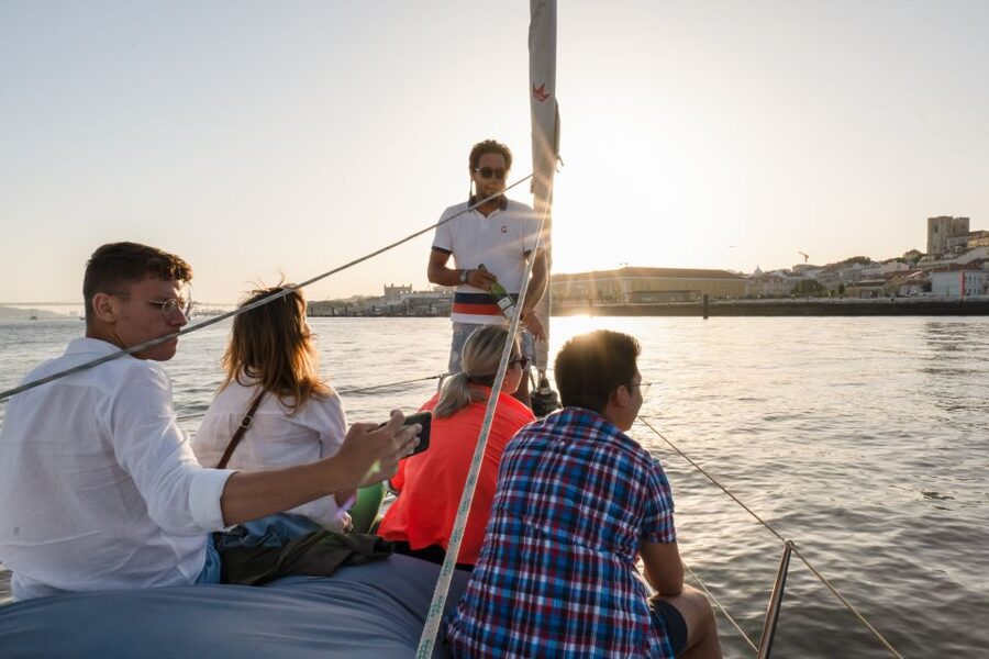 Lisbon: Daytime/Sunset/Night City Sailboat Tour with Drink - Lisbon’s central waterfront from the water