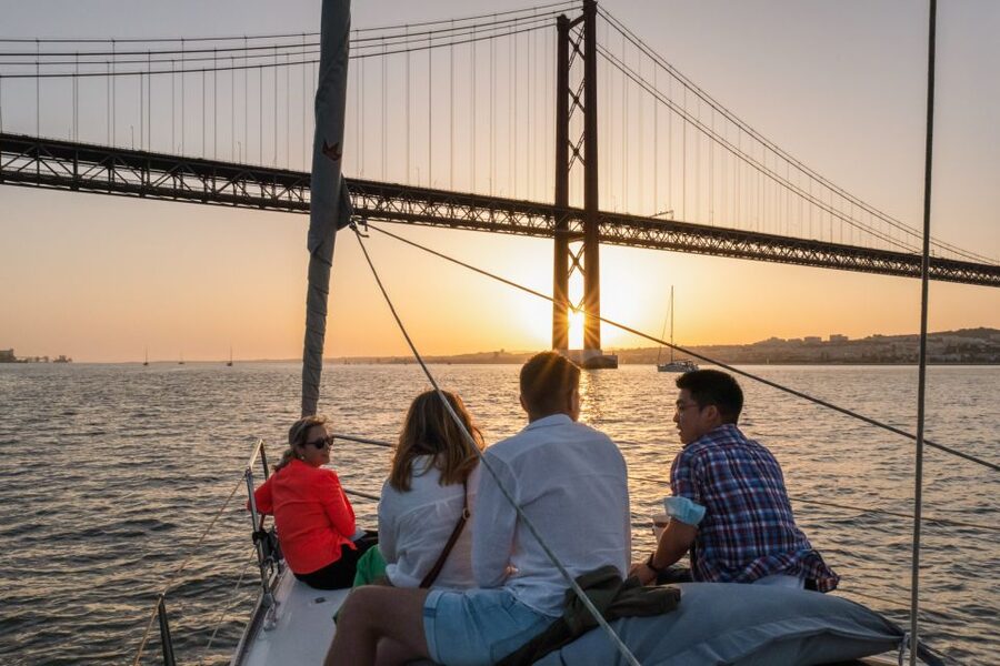 Lisbon: Daytime/Sunset/Night City Sailboat Tour with Drink - Drinks, music, and the onboard atmosphere