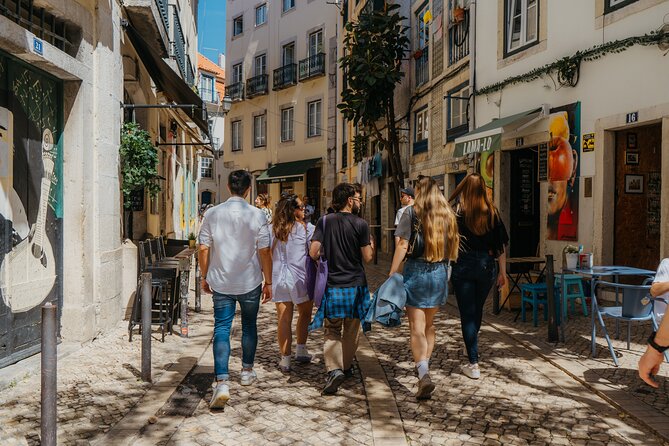 Lisbon Food & Tuk Tuk Tour with Eating Europe - Walking into Alfama for cheese and soup