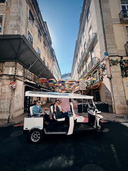 Lisbon: From East to West Private Tour in a Tuk Tuk - Ginja, photos, and the value of a flexible guide