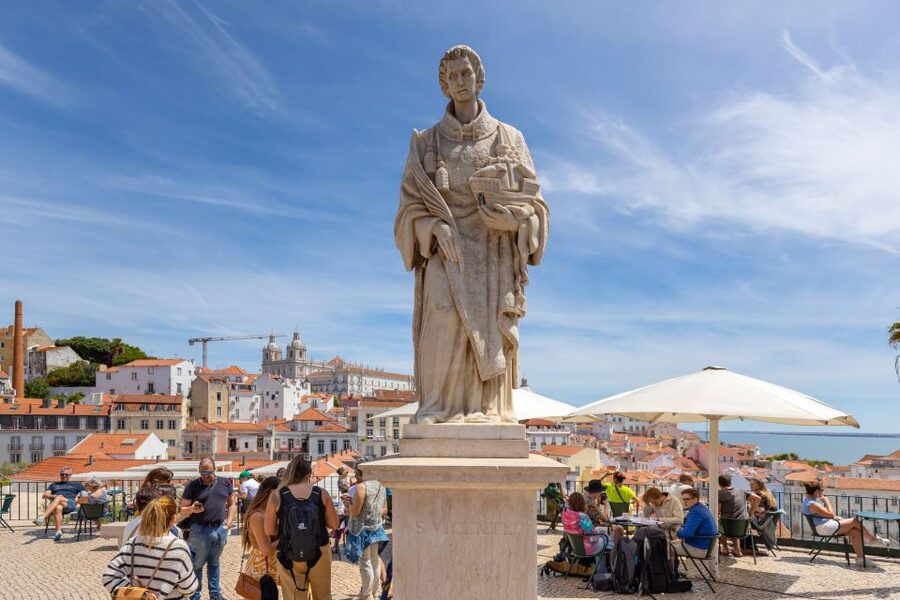 Lisbon: History, Stories and Lifestyle Walking Tour - The tram ride from the castle area toward Portas do Sol