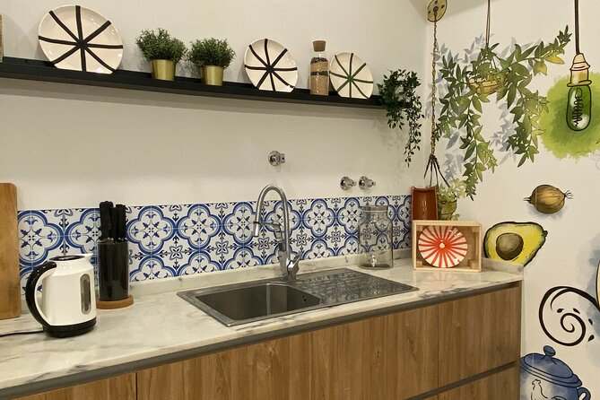 Lisbon Portuguese Cooking Class with 3-Course Dinner - Cooking Portuguese dinner from the first chop