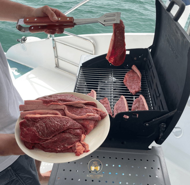 Lisbon: Private Luxury Catamaran Tour with Welcome Drink - Swimming, music, and the onboard bar