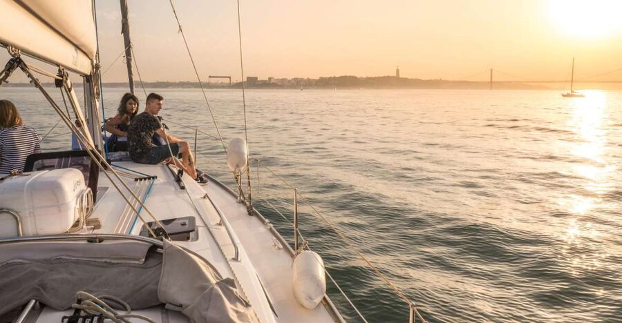 Lisbon: Private Sunset Cruise on the Tagus River with Drink - Leaving Belém beside the Discoveries Monument