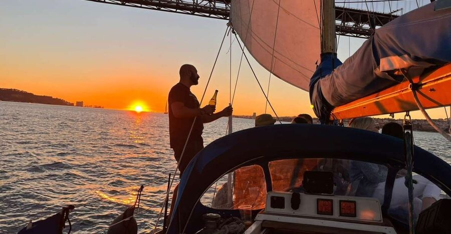 Lisbon: Sailboat Sunset Tour with a Drink - Commerce Square and the broad Tagus view