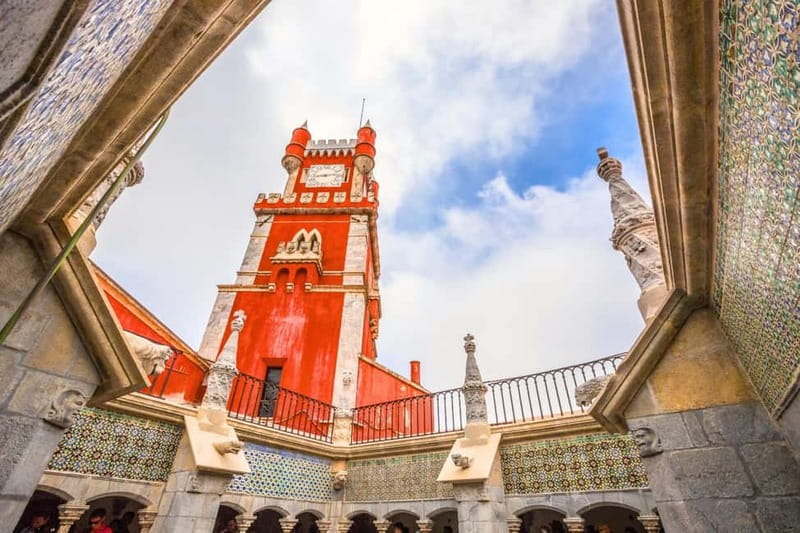 Lisbon: Sintra, Pena, Cascais & Cabo Day Tour with Tickets - Pena Palace: Sintra’s colorful hilltop showpiece