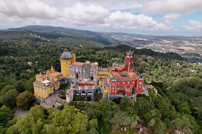 Lisbon: Sintra, Regaleira, Pena, Cabo Roca All Tickets Included - Quinta da Regaleira: secret-looking paths and grand stonework