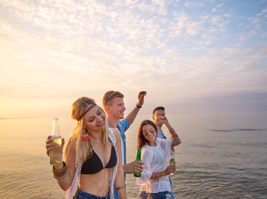 Lisbon: Sunset Boat Party Cruise with DJ and Open Bar - Under the 25 de Abril Bridge