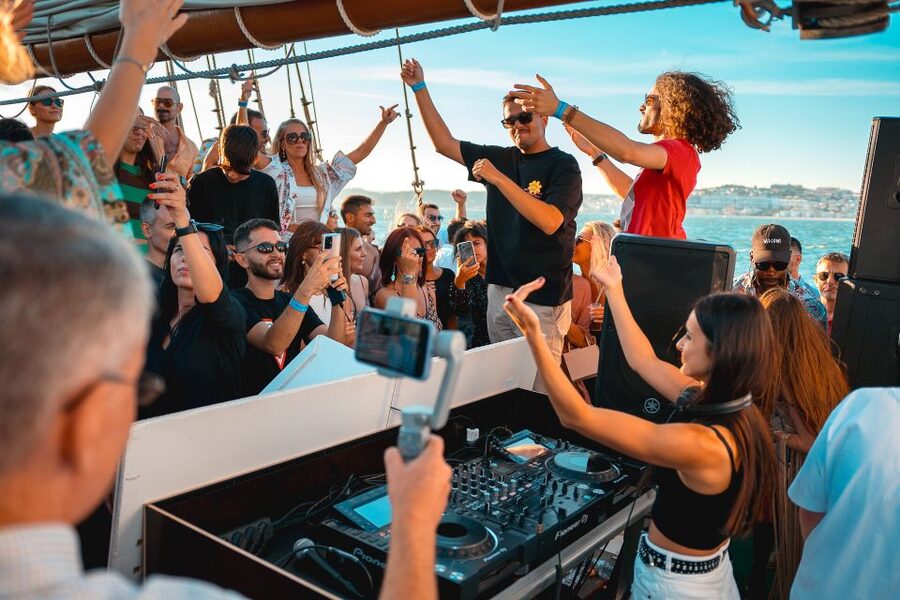 Lisbon: Sunset Boat Party with Live DJ and Night Club Entry - Music, dancing, and the party atmosphere