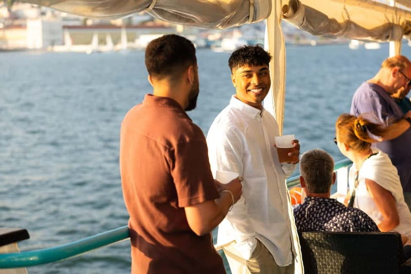 Lisbon: Sunset Boat Tour with Music and Drinks - Commerce Square and Alfama from the water