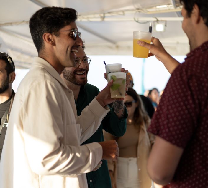 Lisbon: Sunset Boat Tour with Music and Drinks - Music, drinks, and the mood on board