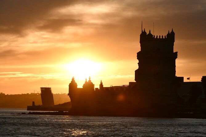 Lisbon: Sunset Catamaran Boat Tour with Music and Drinks - A sunset view of Lisbon from the Tagus